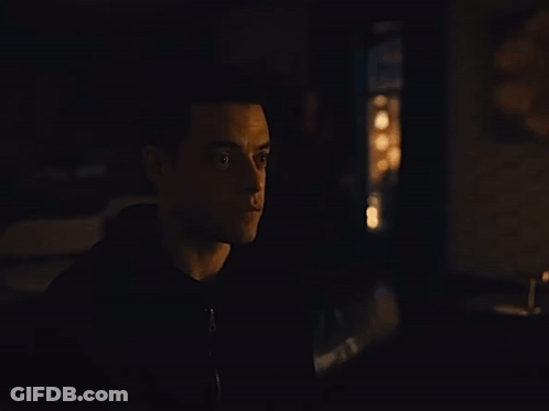 A Close Up Of A Man 'S Face With His Eyes Closed GIF