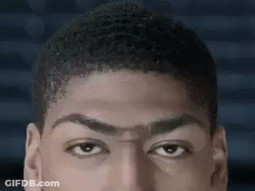 A Close Up Of A Man 'S Face With His Eyes Closed And His Hair Visible . GIF