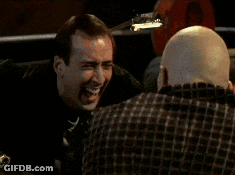 A Close Up Of A Man 'S Face With His Eyes Closed And His Hand On His Forehead GIF