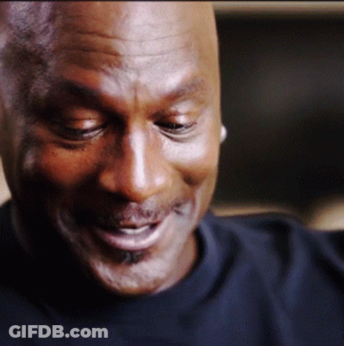 A Close Up Of A Man 'S Face With His Eyes Closed And His Mouth Open GIF