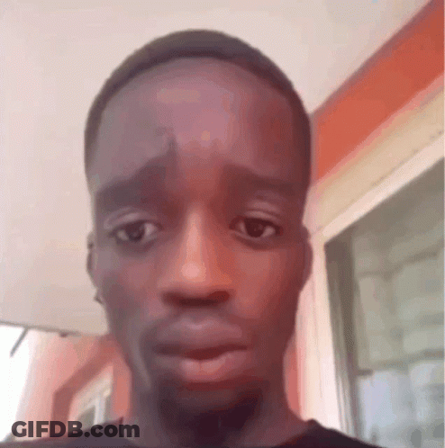 A Close Up Of A Man 'S Face With His Eyes Closed . GIF