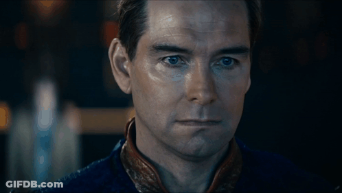 A Close Up Of A Man 'S Face With His Eyes Closed GIF