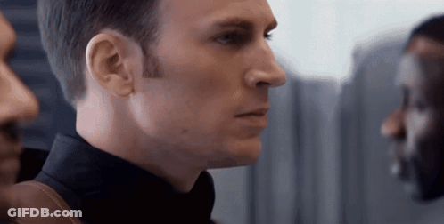 A Close Up Of A Man 'S Face With His Eyes Closed GIF