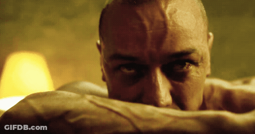 A Close Up Of A Man 'S Face With His Eyes Closed GIF