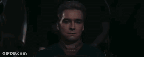 A Close Up Of A Man 'S Face With His Eyes Closed . GIF