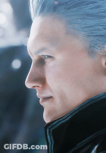 A Close Up Of A Man 'S Face With His Eyes Closed GIF