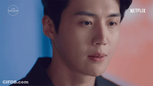 A Close Up Of A Man 'S Face With His Eyes Closed . GIF