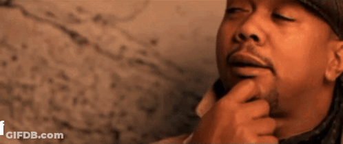 A Close Up Of A Man 'S Face With His Eyes Closed GIF