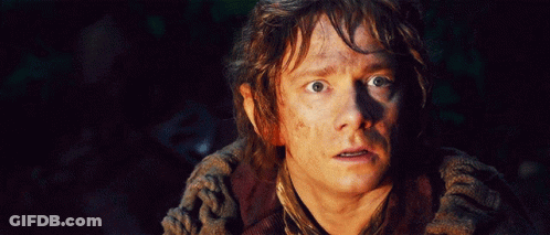A Close Up Of A Man 'S Face With His Eyes Wide Open GIF