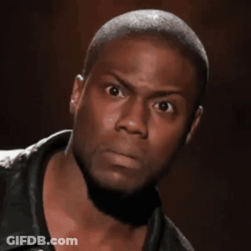 A Close Up Of A Man 'S Face With His Eyes Wide Open GIF