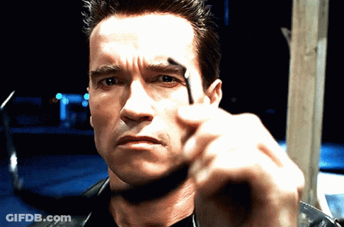 A Close Up Of A Man 'S Face With His Finger Pointing GIF
