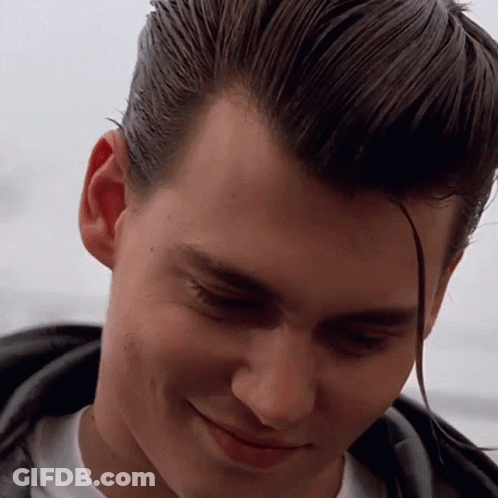 A Close Up Of A Man 'S Face With His Hair Visible GIF