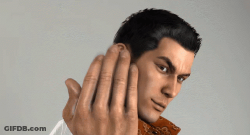 A Close Up Of A Man 'S Face With His Hands Behind His Ear GIF