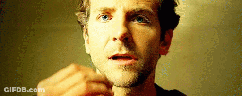A Close Up Of A Man 'S Face With His Mouth Open And A Beard . GIF
