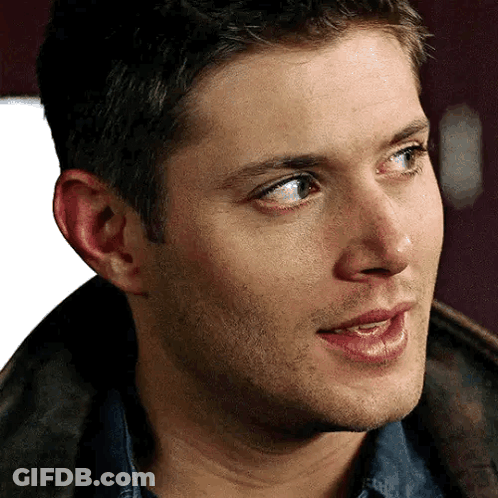 A Close Up Of A Man 'S Face With His Mouth Open And A Beard . GIF