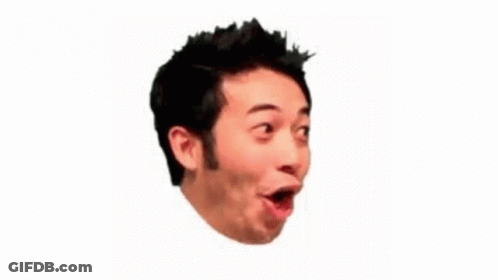 A Close Up Of A Man 'S Face With His Mouth Open And A Surprised Look On His Face . GIF