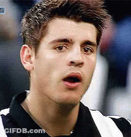 A Close Up Of A Man 'S Face With His Mouth Open And His Eyes Closed GIF