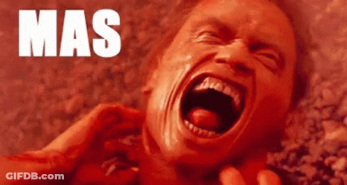 A Close Up Of A Man 'S Face With His Mouth Open And The Word Mas Written On The Bottom . GIF