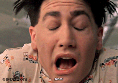 A Close Up Of A Man 'S Face With His Mouth Open And The Words Mom Visible GIF