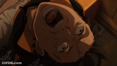 A Close Up Of A Man 'S Face With His Mouth Open GIF