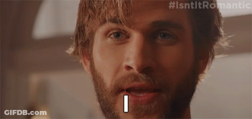 A Close Up Of A Man 'S Face With #Isntltromantic On The Bottom GIF