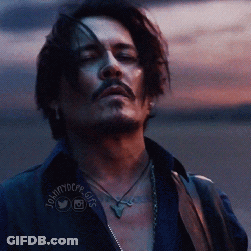 A Close Up Of A Man 'S Face With Johnnydepp Gifs On The Bottom Right GIF
