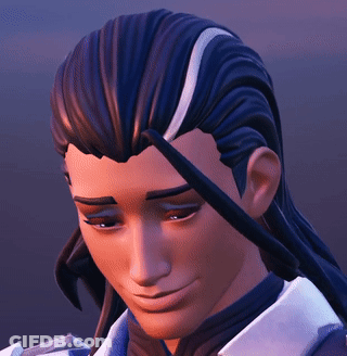 A Close Up Of A Man 'S Face With Long Hair And A Smile On His Face GIF