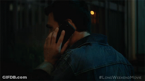 A Close Up Of A Man 'S Face With #Longweekendmovie Written Below It GIF