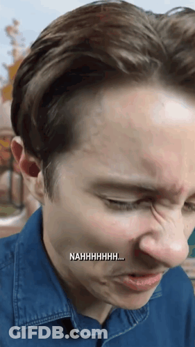 A Close Up Of A Man 'S Face With Nahhhhhhh Written On The Bottom Right GIF