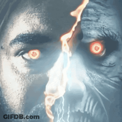 A Close Up Of A Man 'S Face With Red Eyes And A Skull In The Background GIF