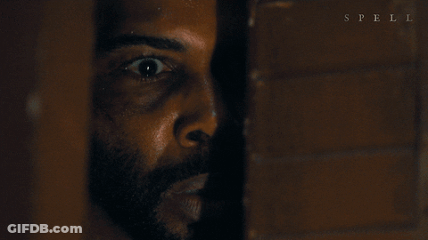 A Close Up Of A Man 'S Face With Spell Written Below Him GIF