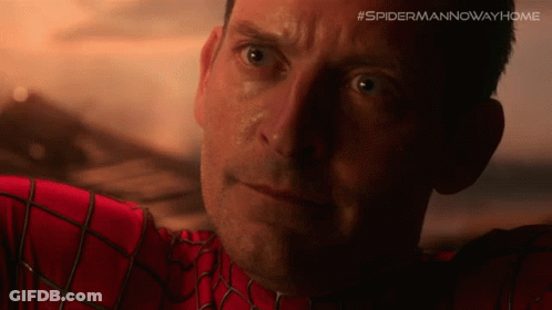 A Close Up Of A Man 'S Face With #Spidermannowayhome Written On The Bottom Right GIF