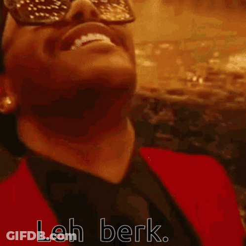 A Close Up Of A Man 'S Face With Sunglasses On And The Words Leh Berk Written On The Bottom . GIF