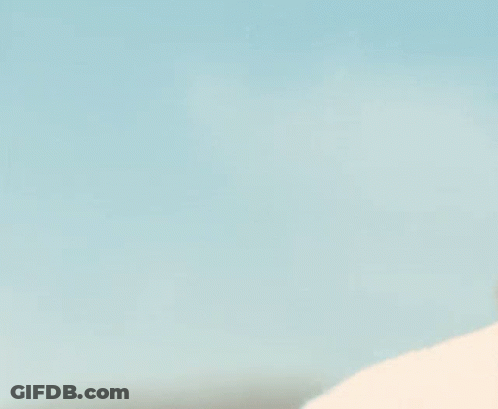 A Close Up Of A Man 'S Face With Sunglasses On GIF
