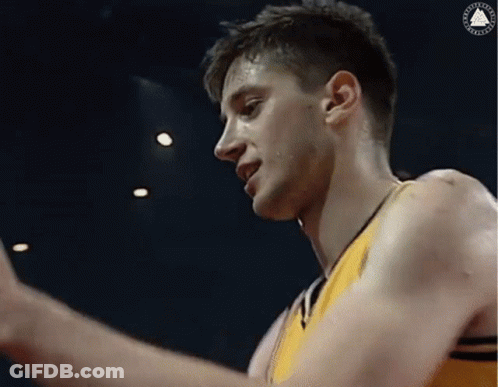 A Close Up Of A Man 'S Face With Sweat Coming Out Of His Face . GIF