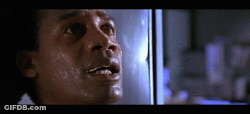 A Close Up Of A Man 'S Face With Sweat Coming Out Of His Mouth GIF
