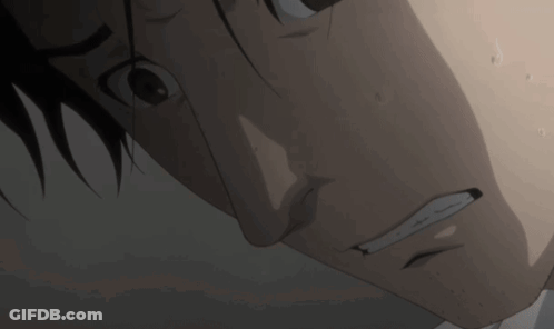 A Close Up Of A Man 'S Face With Sweat Coming Out Of His Mouth GIF