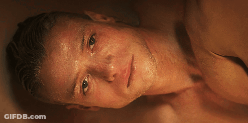A Close Up Of A Man 'S Face With Sweat Coming Out Of It GIF
