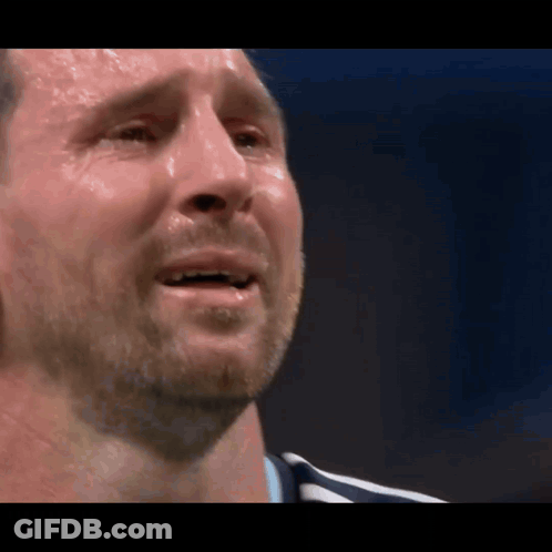 A Close Up Of A Man 'S Face With Sweat On His Face GIF