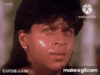 A Close Up Of A Man 'S Face With Tears Coming Out Of His Eyes GIF