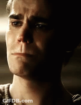 A Close Up Of A Man 'S Face With Tears Running Down His Cheeks . GIF