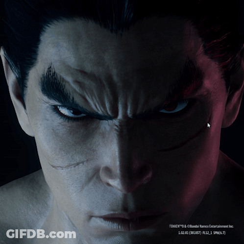 A Close Up Of A Man 'S Face With Tekken Written On The Bottom Left GIF