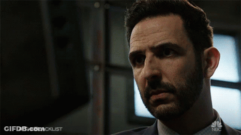 A Close Up Of A Man 'S Face With The Blacklist Written On The Bottom GIF