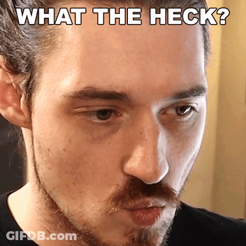 Close Up Of Man's Face With What The Heck Caption GIF