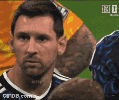 A Close Up Of A Man 'S Face With The Da Zn Logo On The Bottom GIF