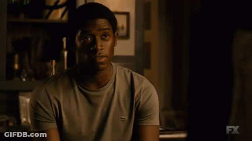 A Close Up Of A Man 'S Face With The Fx Logo Visible GIF