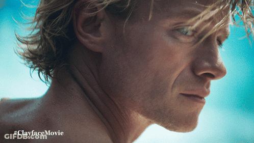 A Close Up Of A Man 'S Face With The Hashtag #Clayfacemovie On The Bottom GIF