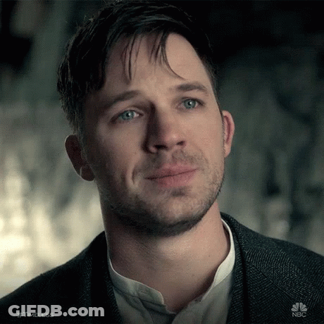 A Close Up Of A Man 'S Face With The Hashtag Timeless GIF