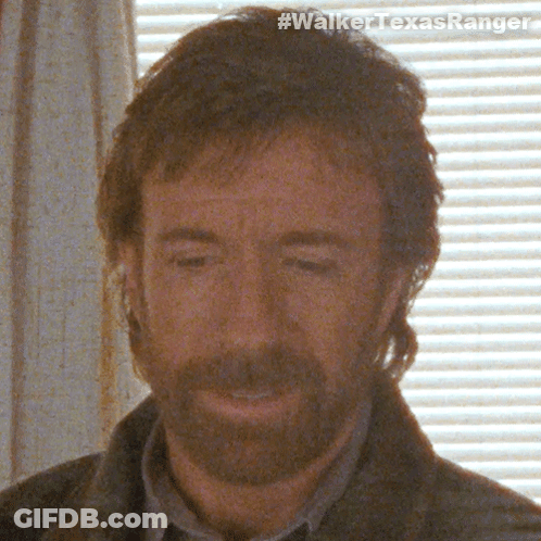 A Close Up Of A Man 'S Face With The Hashtag #Walkertexasranger Visible GIF