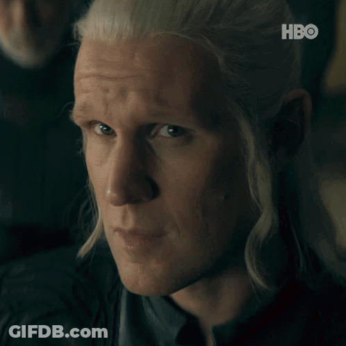 A Close Up Of A Man 'S Face With The Hbo Logo In The Background GIF